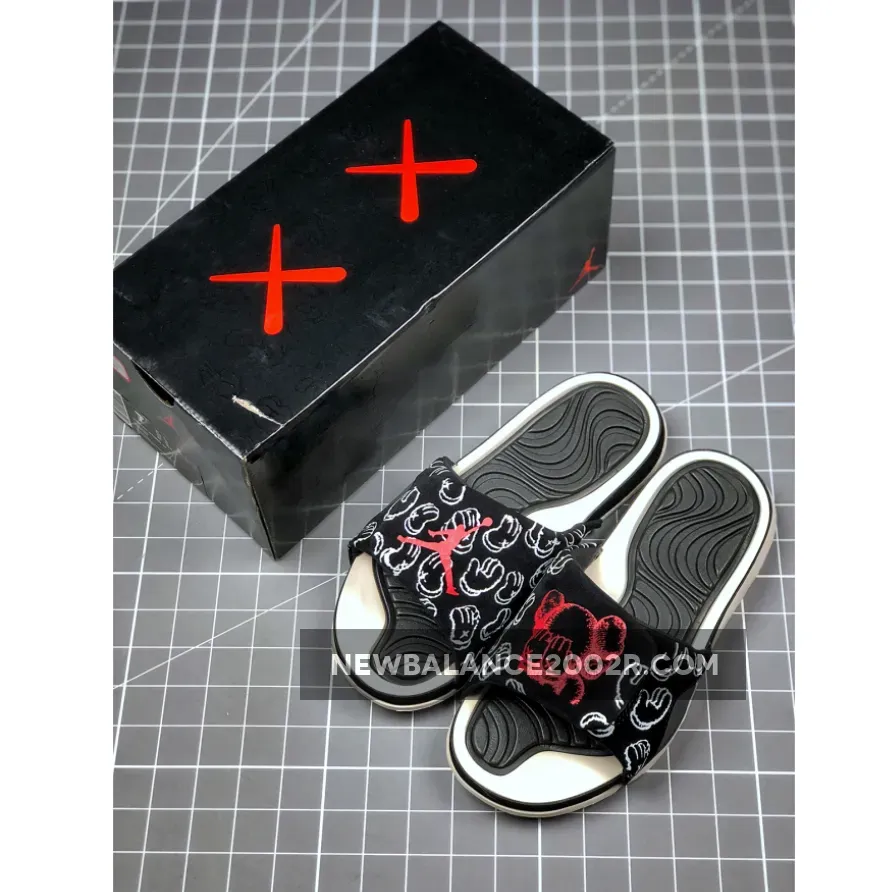 Kaws x Air Jordan 4 Black Slide Sandals